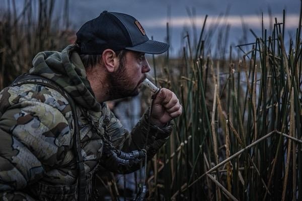 Hunter calling as the light comes up over the marsh